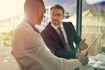 two men and a tablet